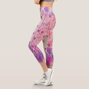 a design of a purple background with dots capri leggings