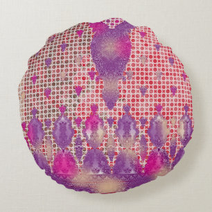 a design of a purple background with dots round cushion
