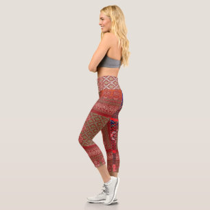 a design of a red and beige pattern capri leggings