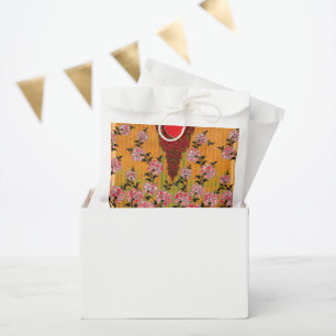 a design of a red and black wall hanging favour bag