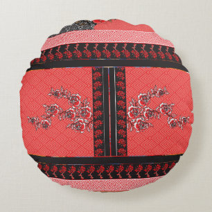 a design of a red and black wallpaper round cushion