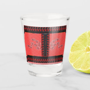 a design of a red and black wallpaper shot glass