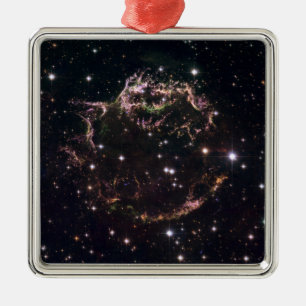 A detailed view at the tattered remains metal tree decoration