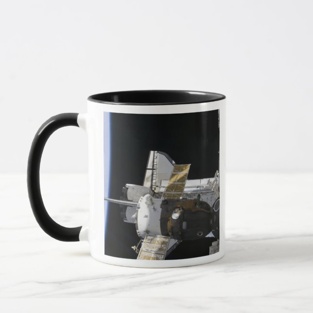 A docked Soyuz spacecraft Mug (Left)