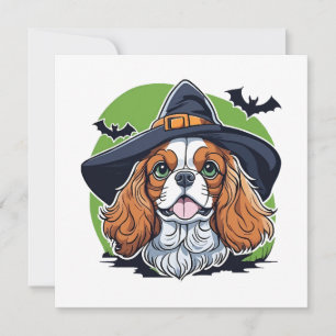 A dog wearing a witches hat with bats