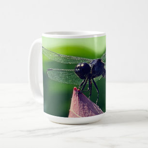 A dragonfly coffee mug