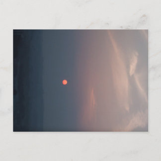 A dramatic, cinematic sunset postcard