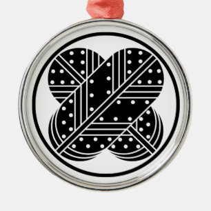 a falcon's feather metal ornament