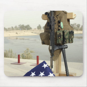 A fallen soldiers gear display mouse pad