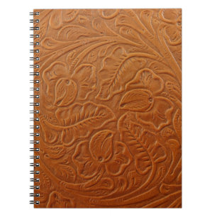 A fancy tan brown light coloured background made o notebook