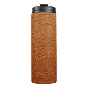 A fancy tan brown light coloured background made o thermal tumbler