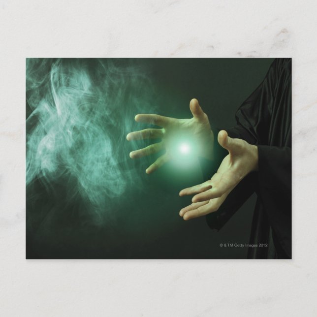 A fantasy wizard making magic with his hands. postcard (Front)