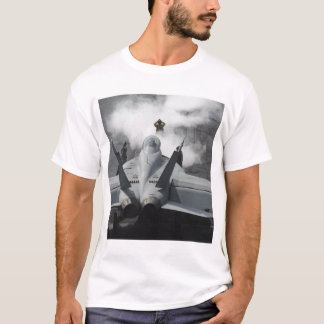A flight deck director signals an F/A-18F T-Shirt