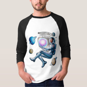 A floating astronaut holding a glowing orb T-Shirt