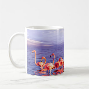A flock of beautiful pink flamingos against a purp coffee mug