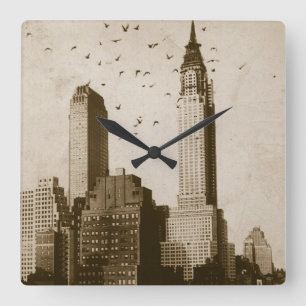 A flock of birds flying square wall clock