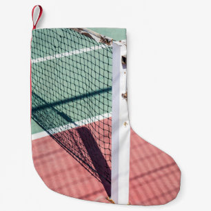 A FOCUSED SHOT OF A POST ON ONE SIDE OF A TENNIS N SMALL CHRISTMAS STOCKING