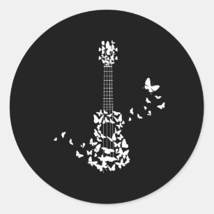 A Four String Ukulele Instrument With Beautiful Classic Round Sticker