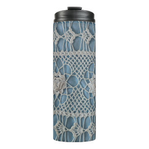 A fragment of a wide lace insert contains small wh thermal tumbler