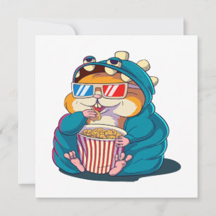 A funny hamster wearing glasses eats popcorn