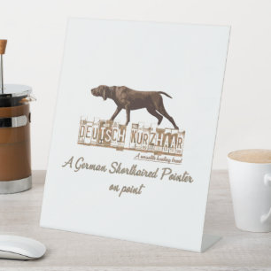 A German Shorthaired Pointer on point Pedestal Sign