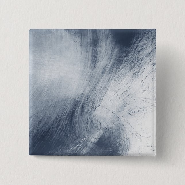 A giant whirlpool cloud swirls above the sea 15 cm square badge (Front)