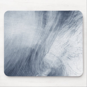 A giant whirlpool cloud swirls above the sea mouse pad