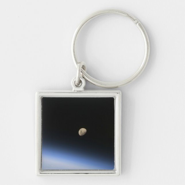 A gibbous moon visible above Earth's atmosphere 2 Key Ring (Front)