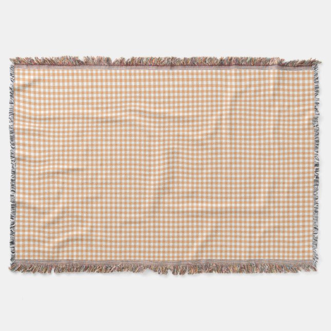 A gingham chequered blanket in shades of beige  (Front)