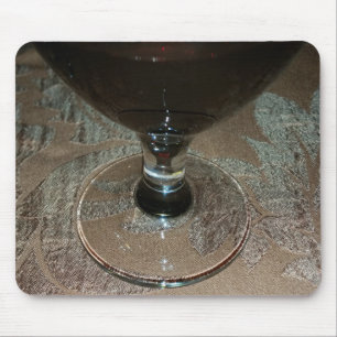 a glass of red wine mouse pad
