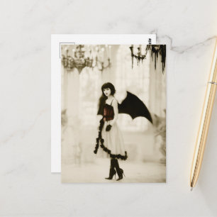 A gothic angel with bat wings postcard