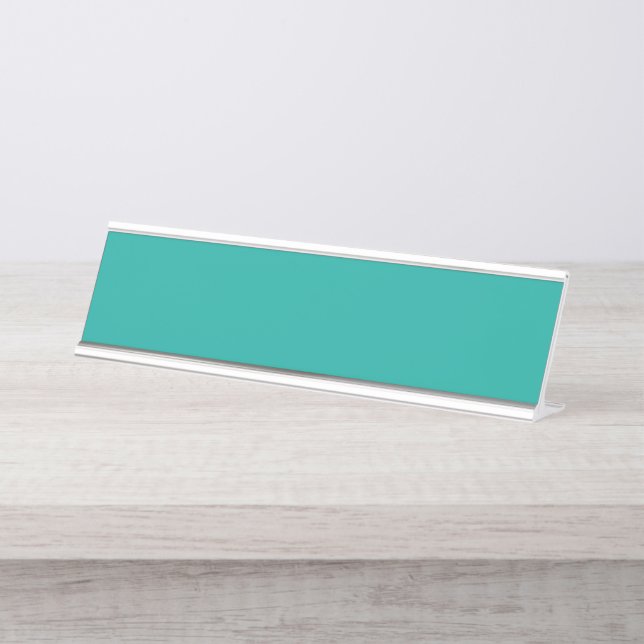 A gradient background blending blue into green. desk name plate (Front)