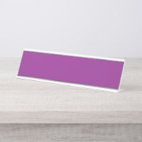 A gradient background blending shades of pink and 