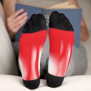 A graphic design featuring bold red and orange sha socks