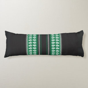 a green and black pattern with a tree in the middl body cushion