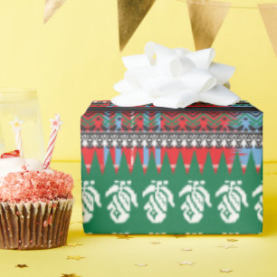 a green and black pattern with a tree in the middl wrapping paper