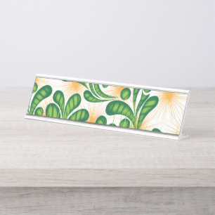 A green and gold artistic pattern depicting a tree desk name plate