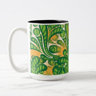 A green and gold artistic pattern depicting a tree Two-Tone coffee mug