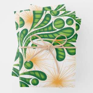 A green and gold artistic pattern depicting a tree wrapping paper sheet