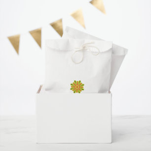 a green and red flower with black dots favour bag