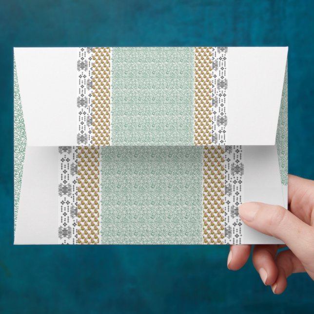 a green and white background with small leaves envelope (Hand)