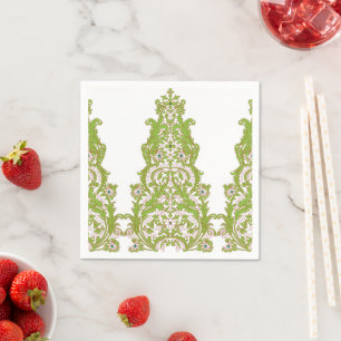 a green and white wallpaper with ornate designs napkin