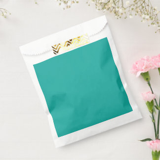 a green background with a favour bag