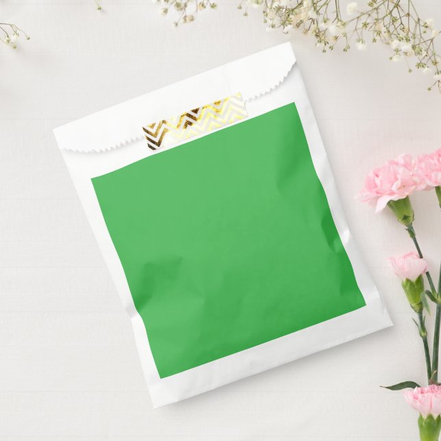 a green background with a white border favour bag (Sealed)