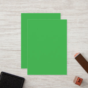 a green background with a white border loyalty card