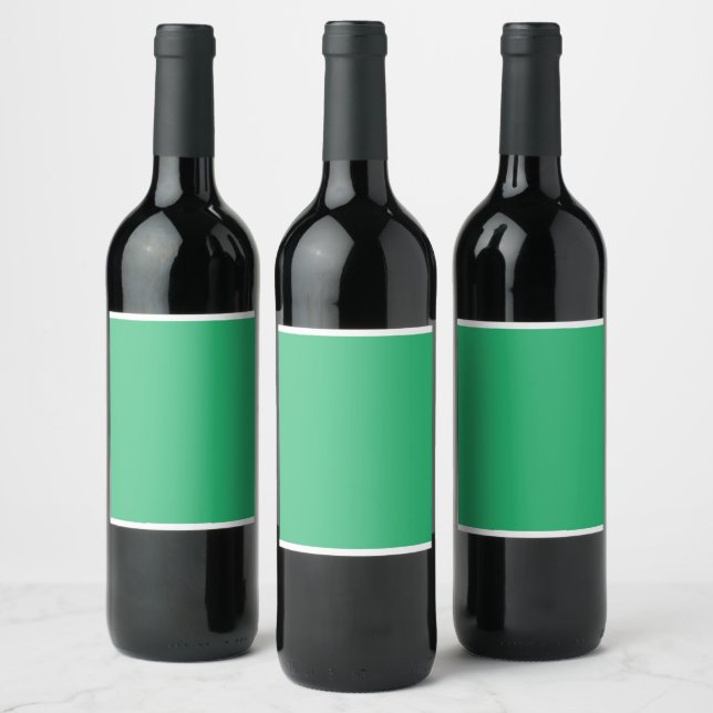 a green background with a white border wine label (Bottles)