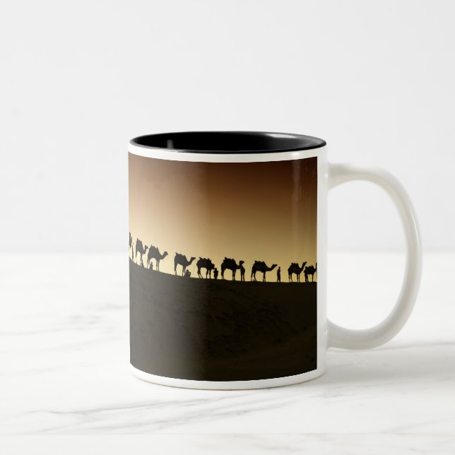A group of camel herders with their camels Two-Tone coffee mug (Right)