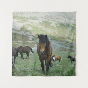 A GROUP OF HORSES ON A MOUNTAIN PASTURE TAPESTRY