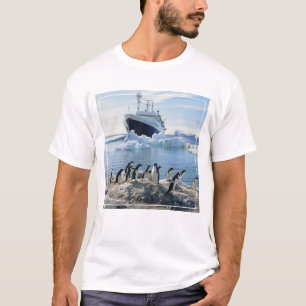 A Group Of Penguins Standing On An Icy Beach T-Shirt