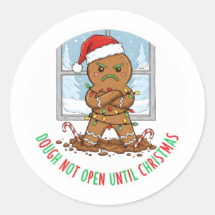 A grumpy gingerbread man classic round sticker